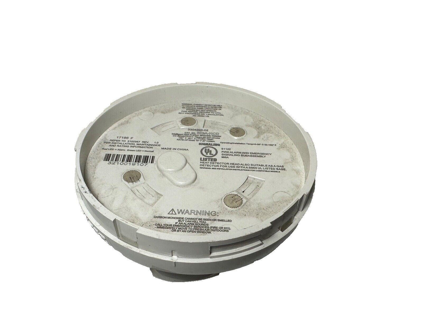 White fire alarm heat and carbon monoxide detector with UL listing, model 3304306-06, for commercial or residential use