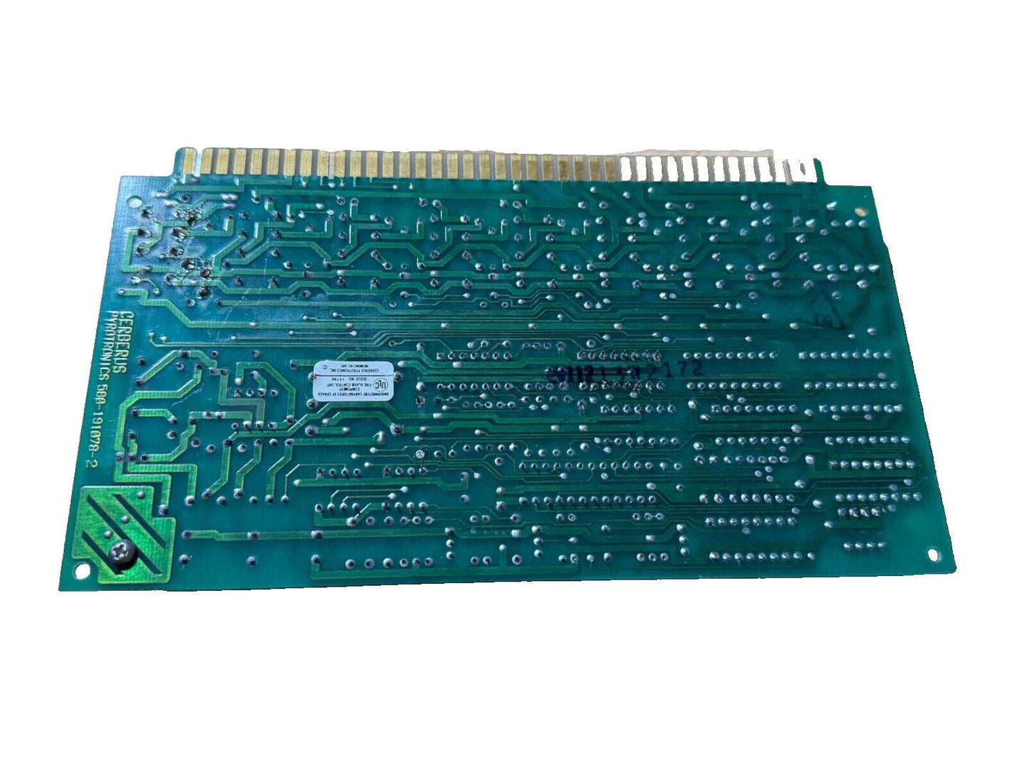Cerberus Pyronics fire alarm control panel circuit board with green PCB and gold connectors
