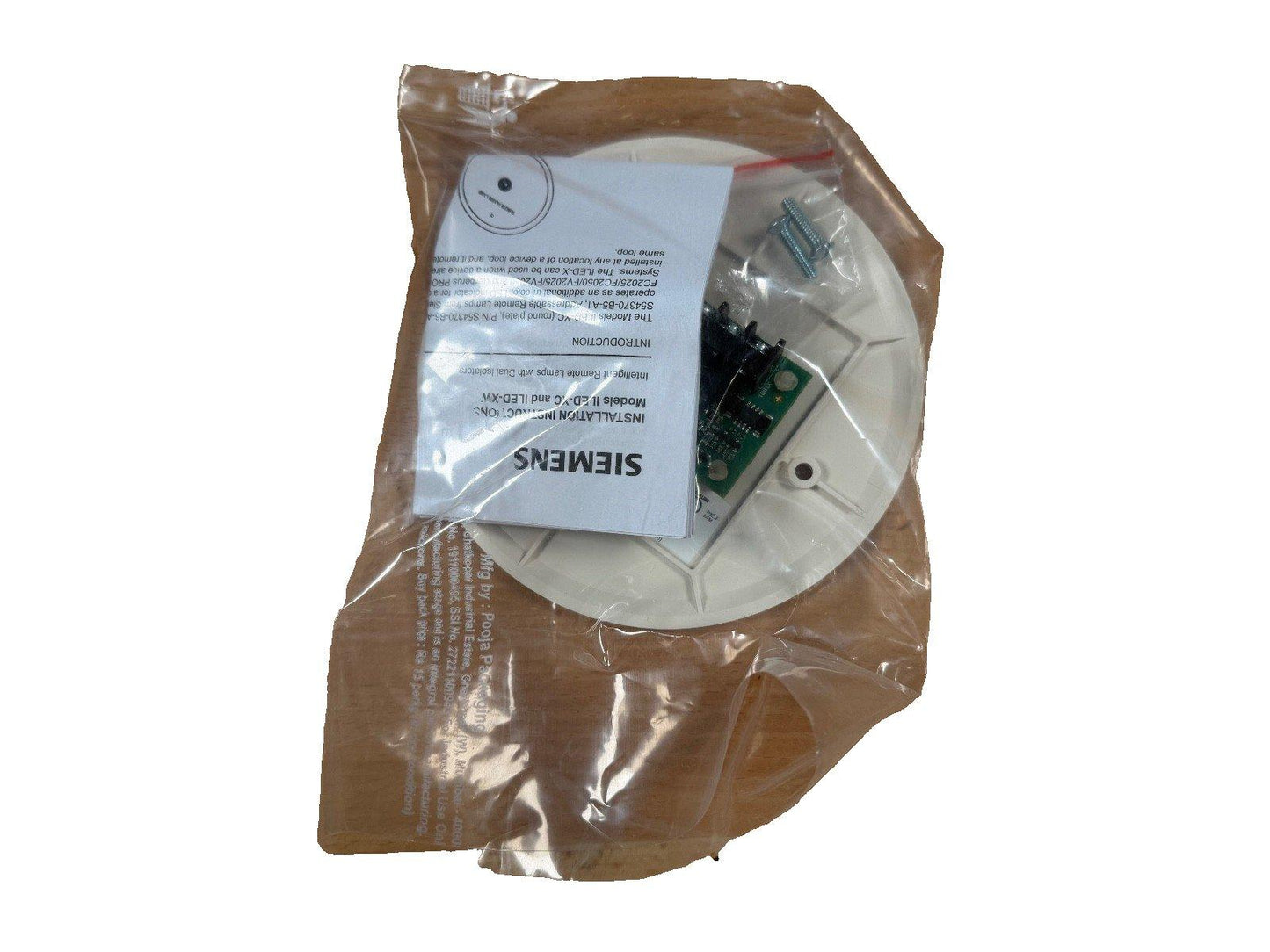 Siemens fire alarm remote lamp kit with installation guide, screws, and circuit board in sealed packaging