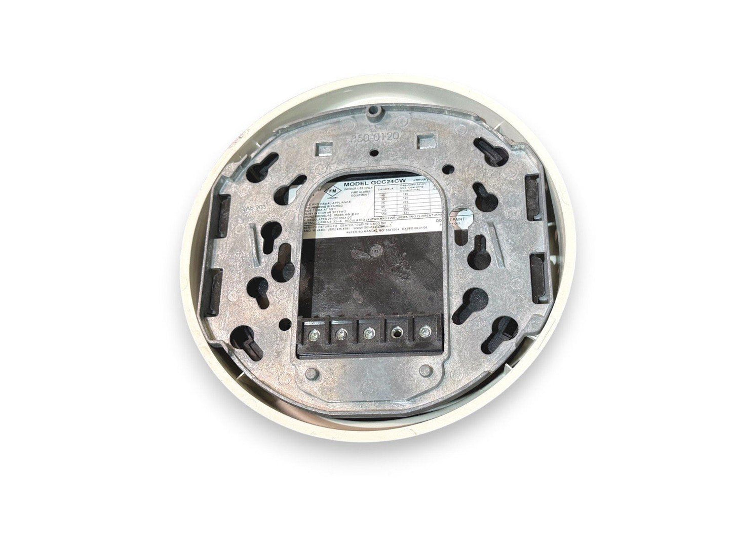 Gentex GCC24CW fire alarm device backplate with wiring terminals and model label