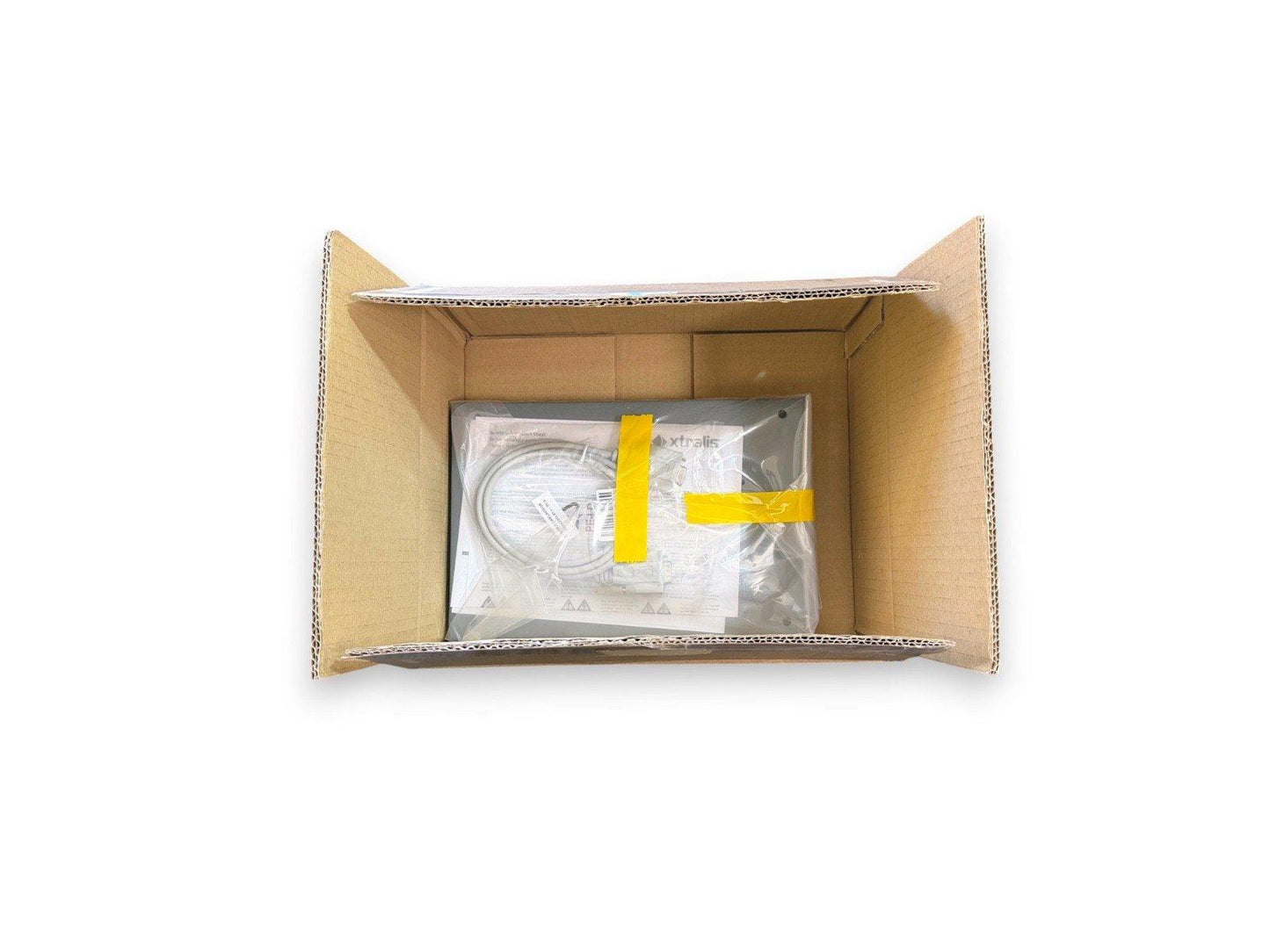 Xtralis fire alarm equipment in open box with yellow tape, ready for installation