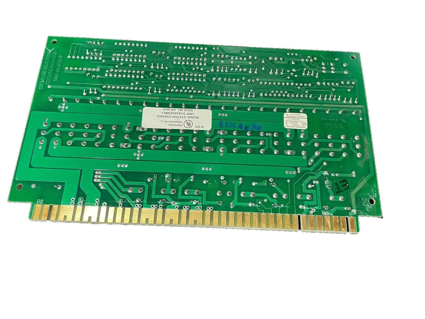 Siemens fire alarm control panel circuit board, green PCB with gold edge connectors and UL label