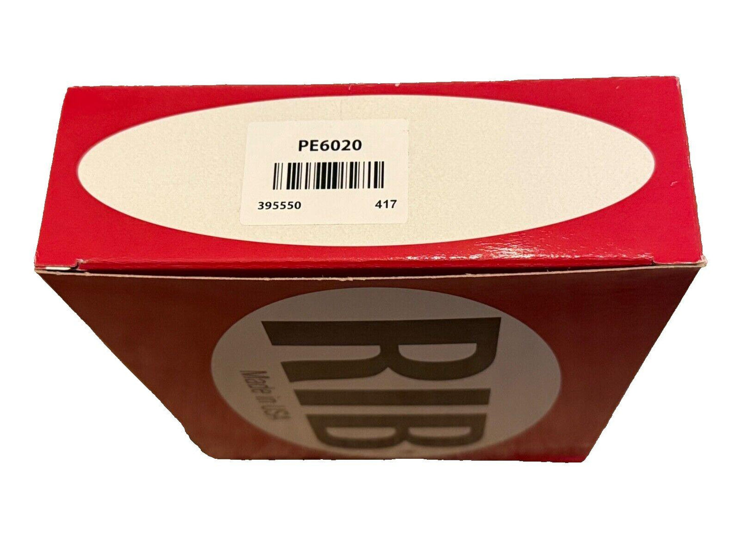 Red box with PE6020 label, fire alarm equipment part, made in USA