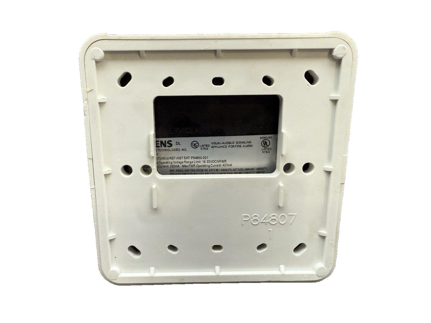 Back of a white fire alarm device with UL listing and model P84807, for fire safety systems.
