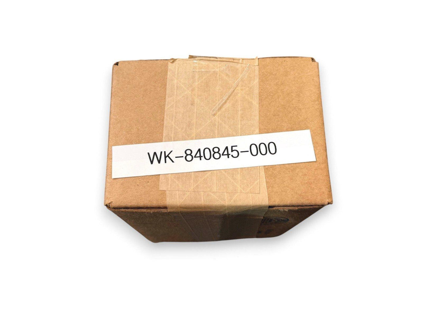 Sealed cardboard box with label WK-840845-000, fire alarm equipment part, ready to ship