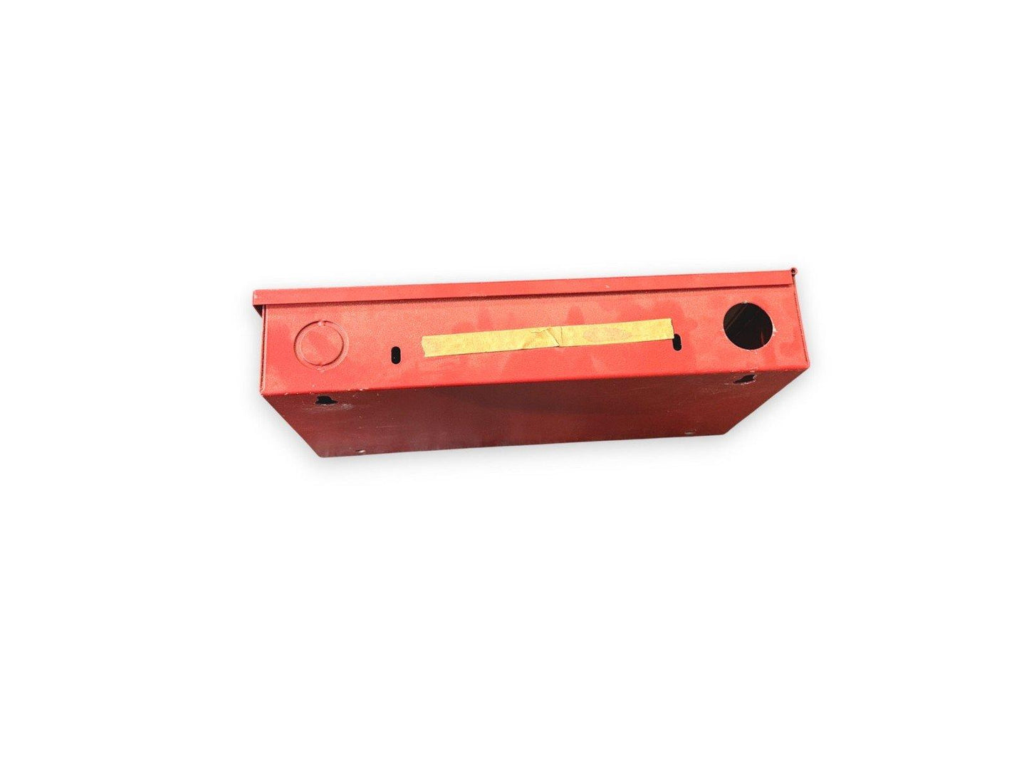 Red fire alarm pull station box with yellow tape, used fire safety equipment