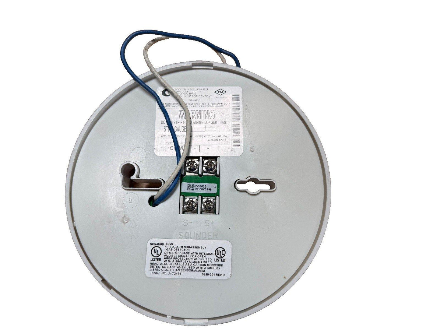 Fire alarm detector base with wiring terminals and UL listed labels for safety compliance