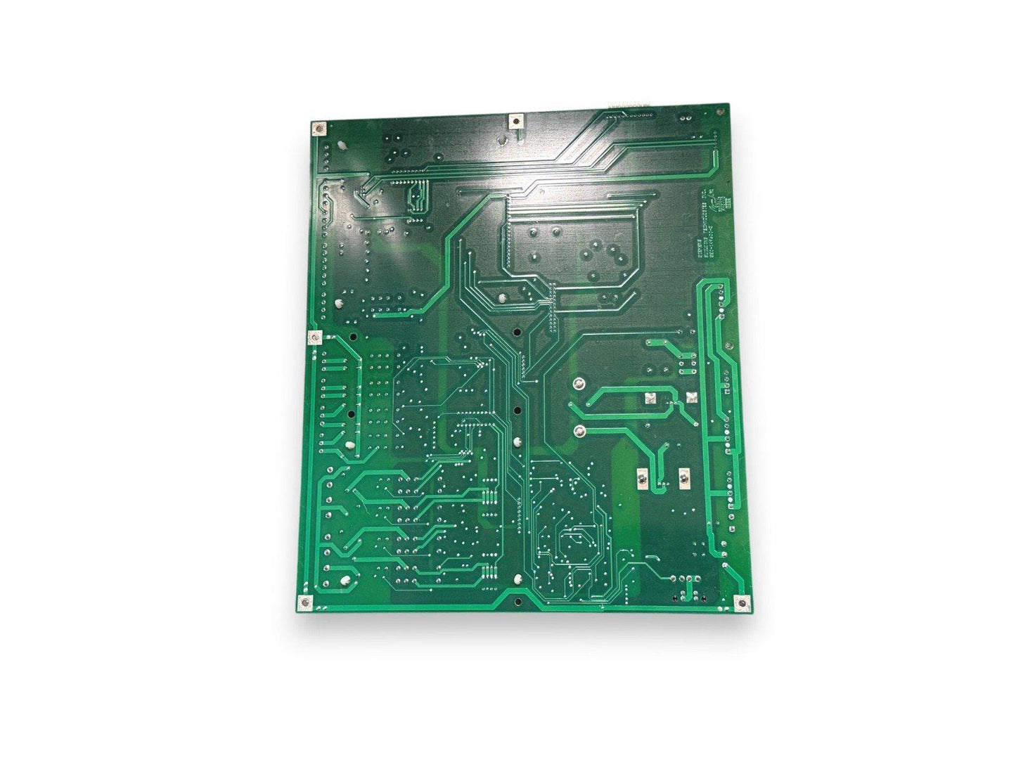 Green fire alarm control panel circuit board with traces and mounting holes