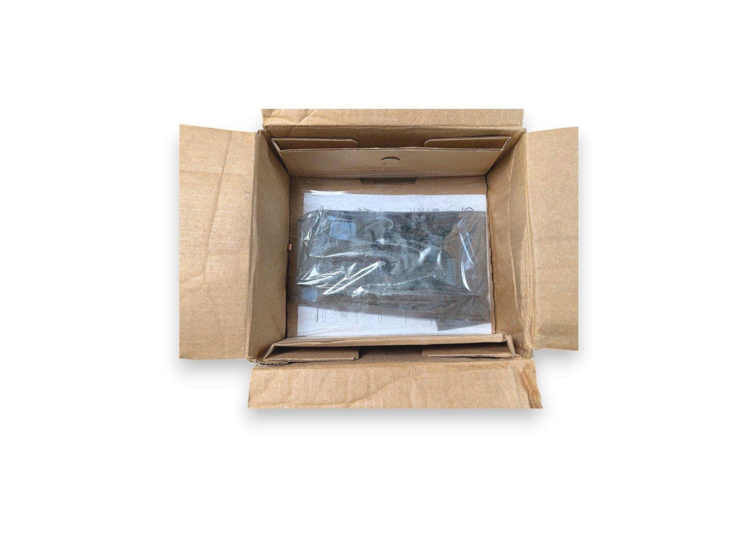 Open cardboard box with fire alarm equipment sealed in plastic, ready for shipping