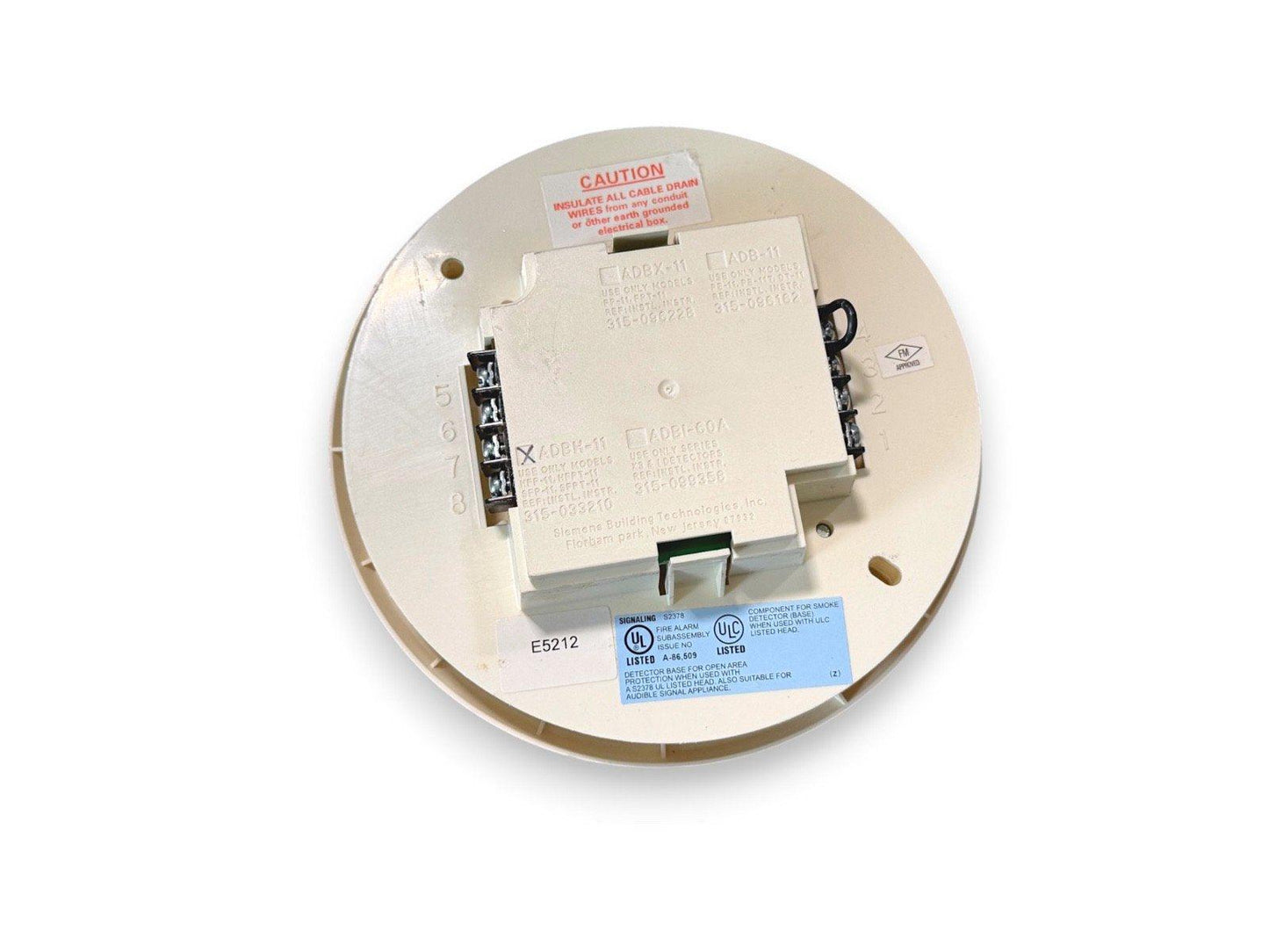 Fire alarm smoke detector base with wiring terminals and UL listed label, model E5212