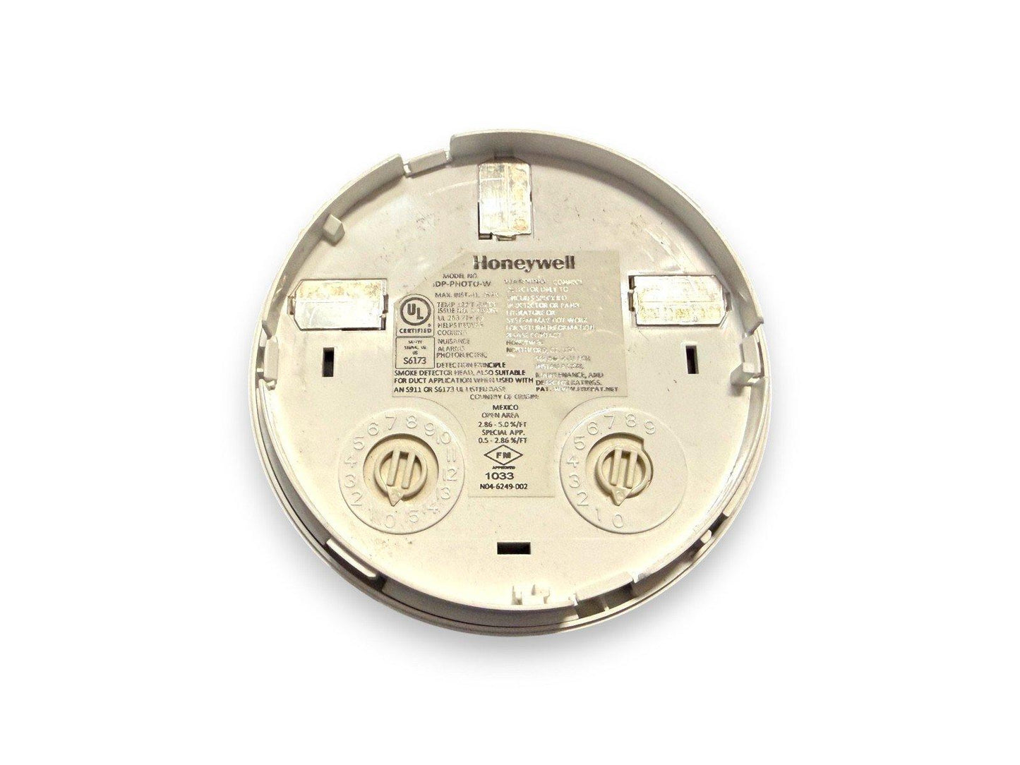Honeywell DP-PHOTO-W photoelectric smoke detector back view with UL certification and wiring terminals