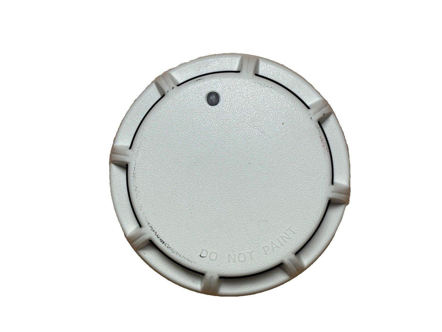 White fire alarm smoke detector with 'DO NOT PAINT' label, circular design, and central sensor