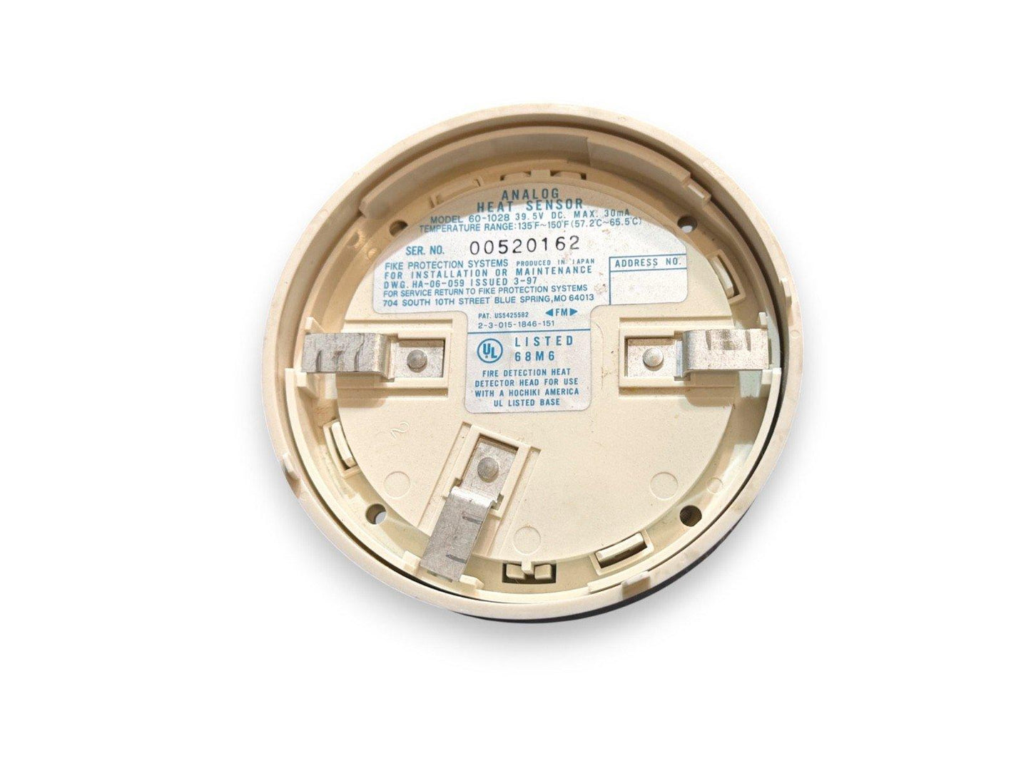 Analog heat sensor for fire alarm systems, UL listed, model 60-1028, with terminal connections and specs label.