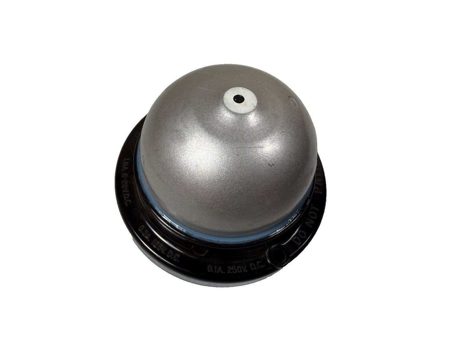 Fire alarm bell with metallic dome and black base, labeled for 250V DC use