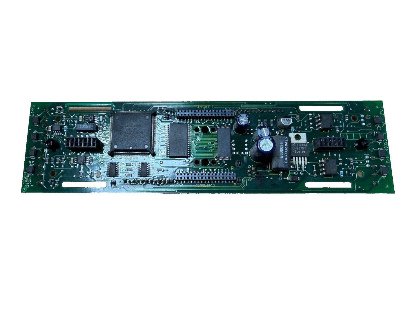 Fire alarm control panel circuit board with chips and capacitors for fire safety systems