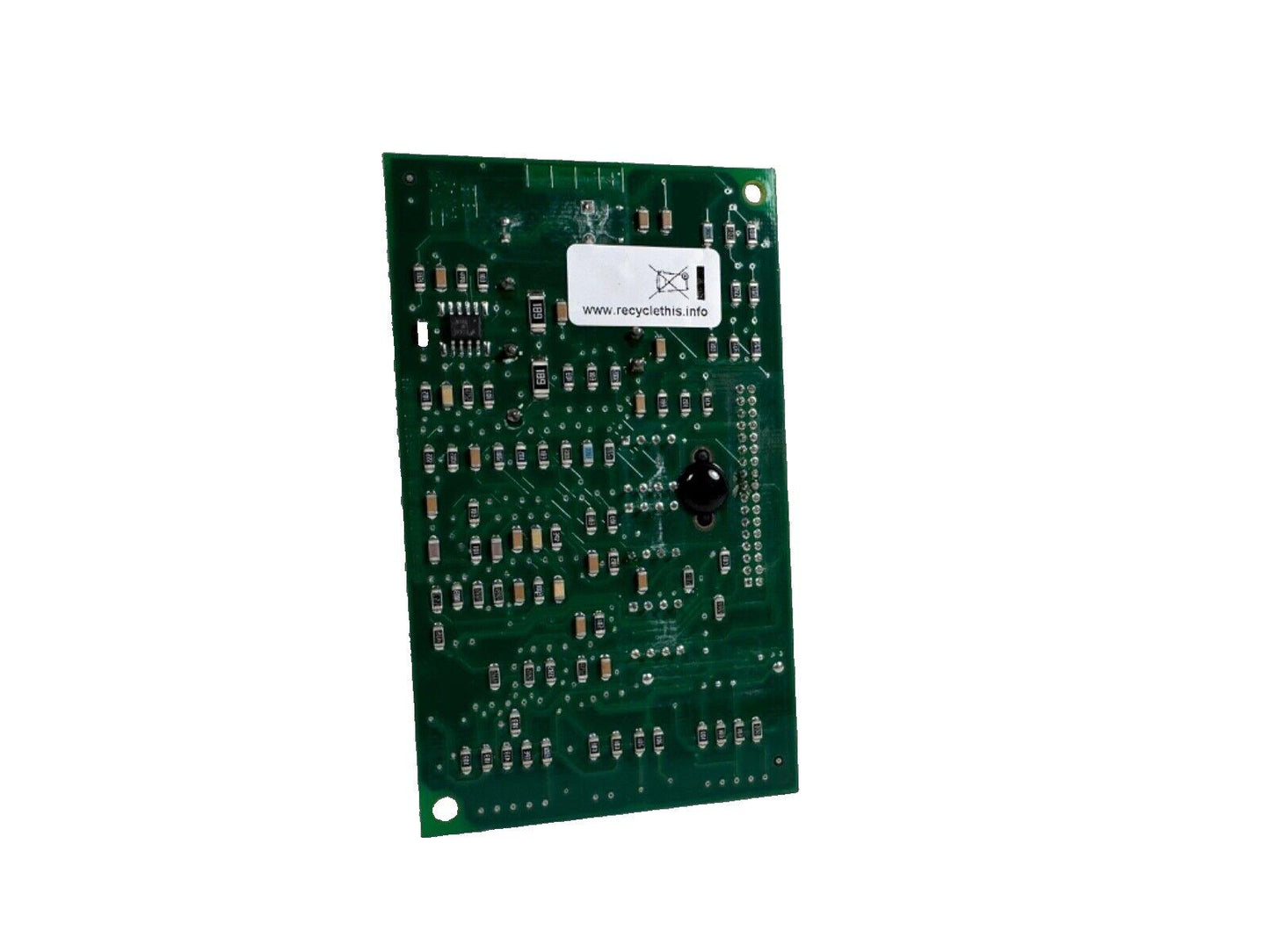 Green fire alarm control panel circuit board with electronic components and recycling label