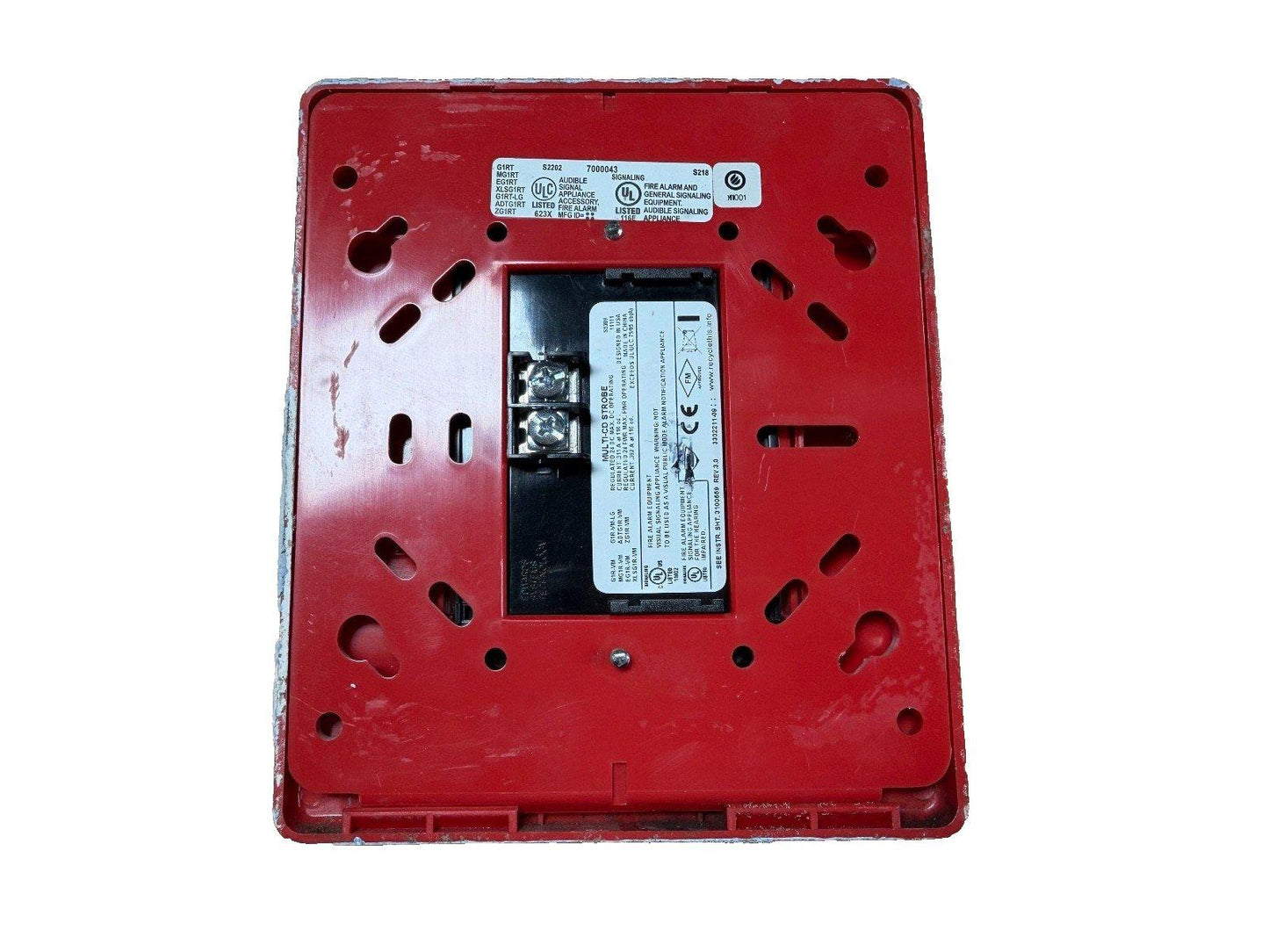 Red fire alarm strobe backplate with UL listed labels and wiring terminals