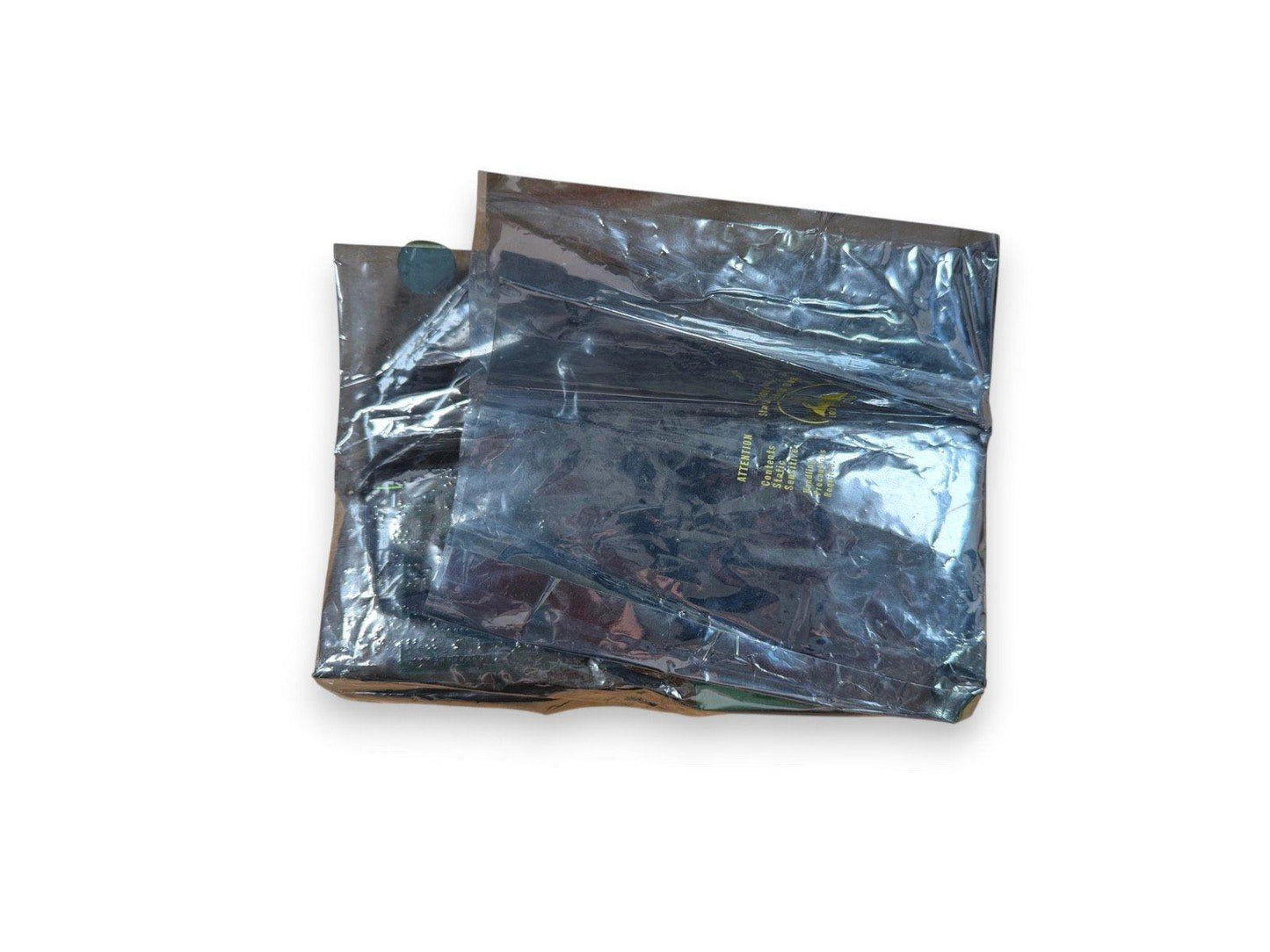 Sealed fire alarm equipment in anti-static bag, ready for installation or storage