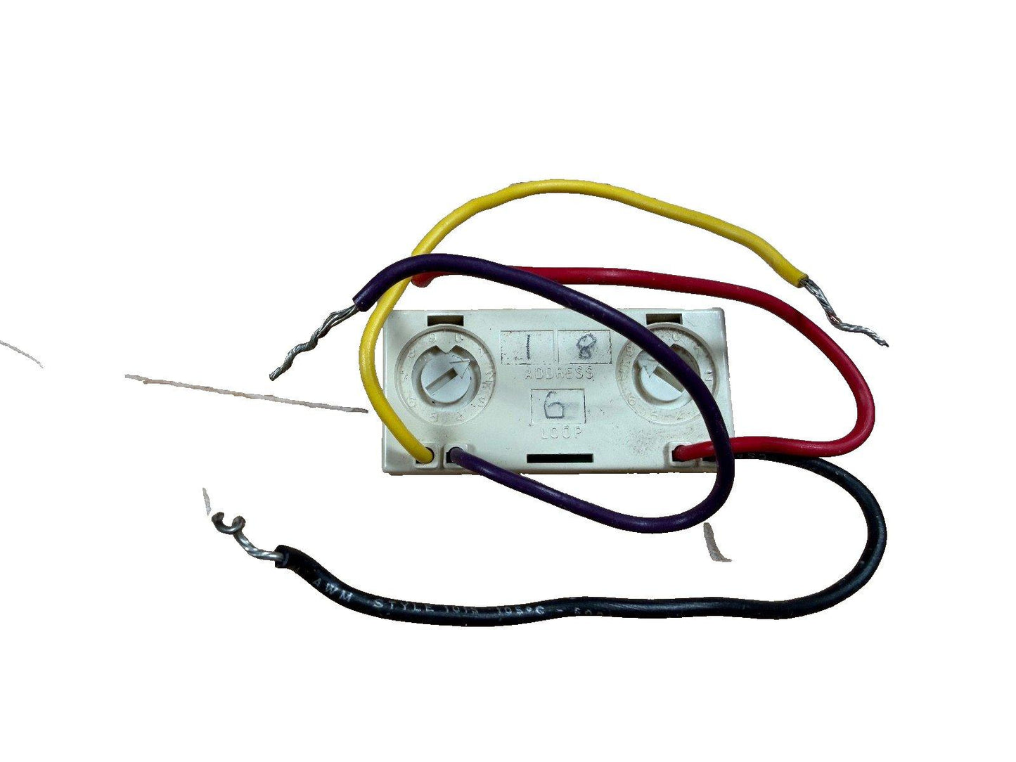 Fire alarm module with addressable dials and multi-colored wiring for system installation