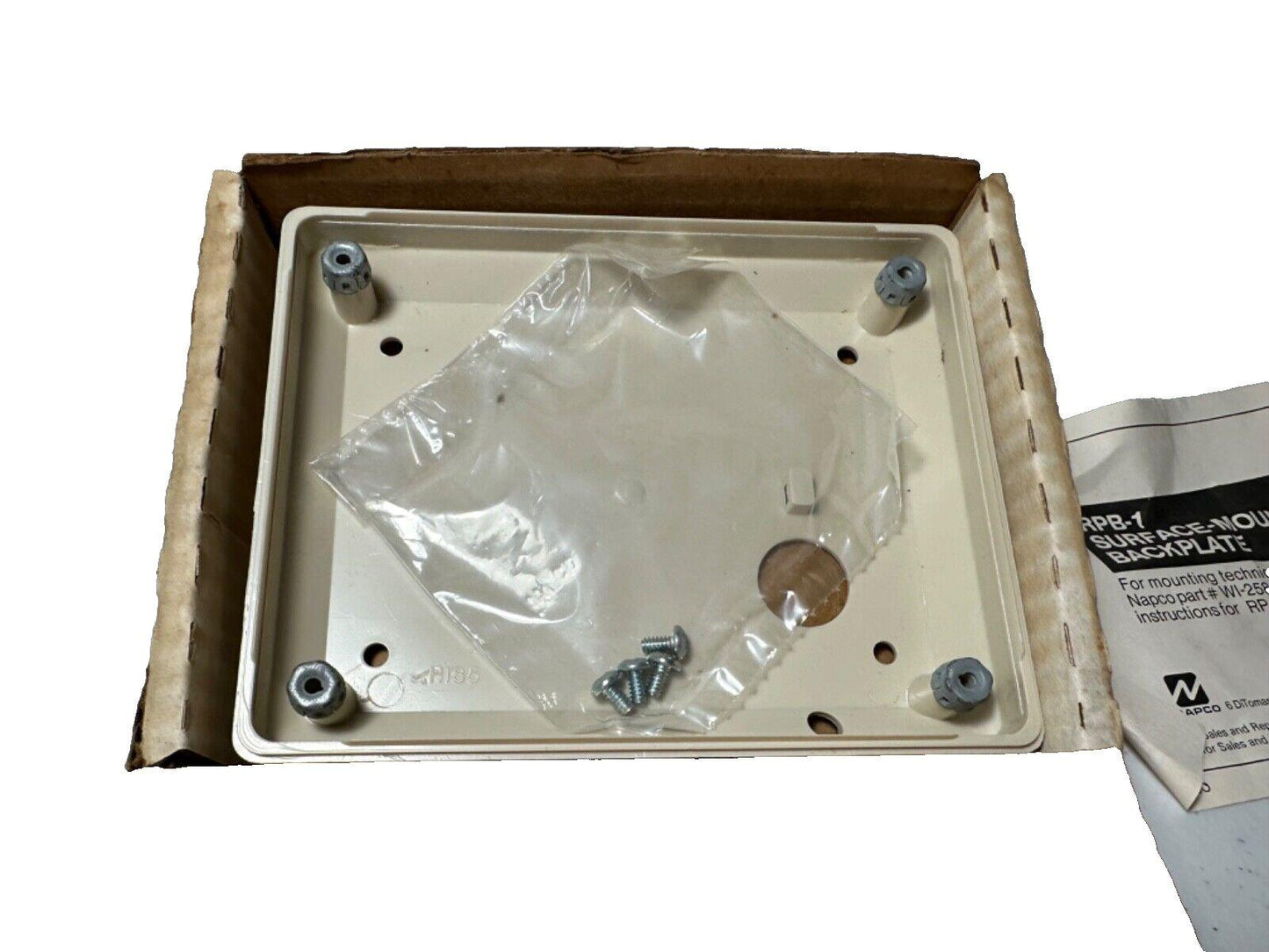 Napco RPB-1 surface mount backplate with screws and hardware for fire alarm installation