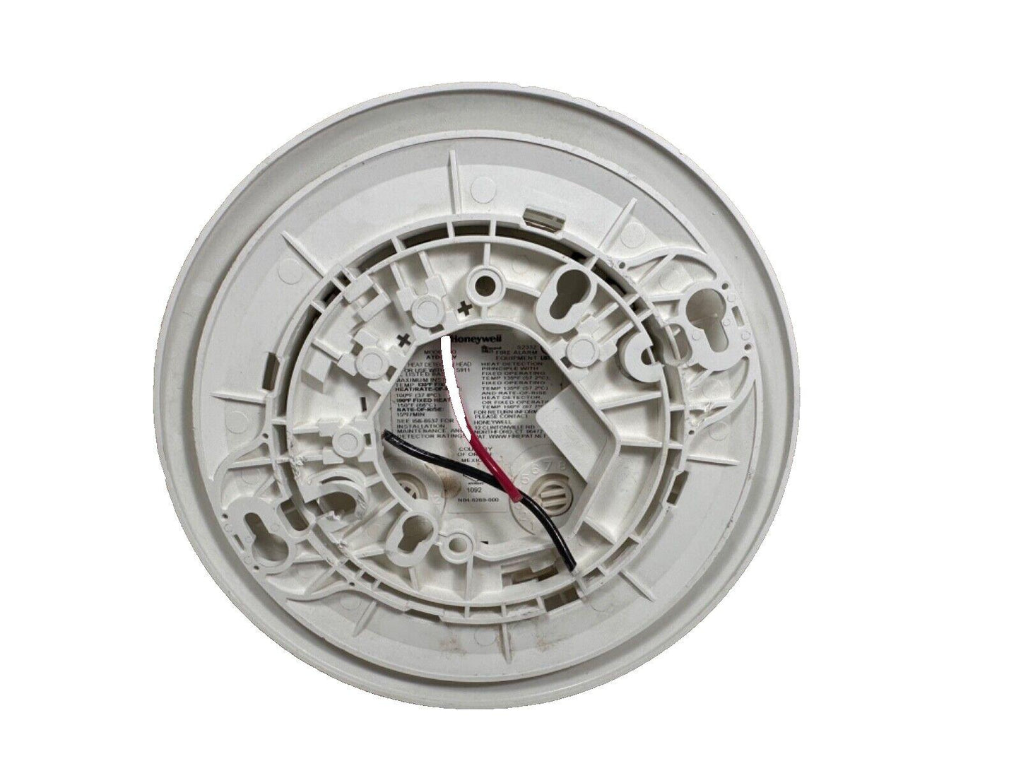 Honeywell fire alarm heat detector with wiring, white circular base for commercial or residential use