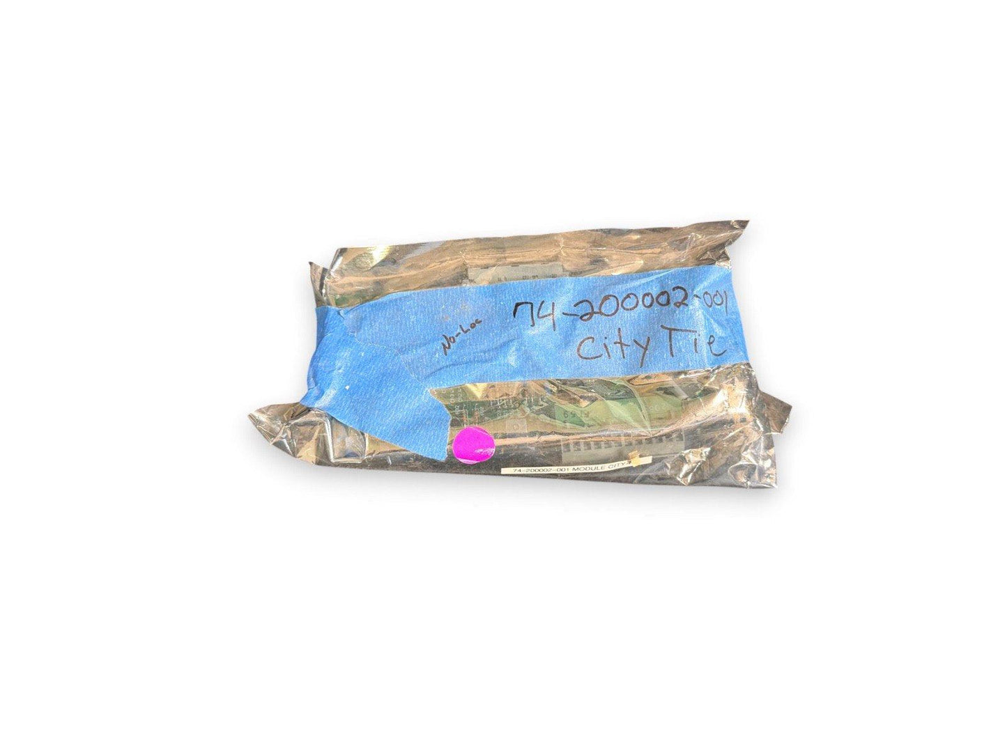 Sealed fire alarm module 74-200002-001 City Tie in anti-static bag with blue tape label