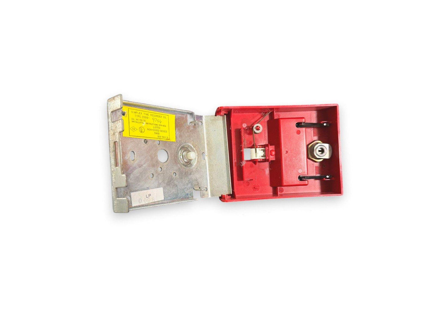 Red fire alarm pull station with metal backplate and internal components visible