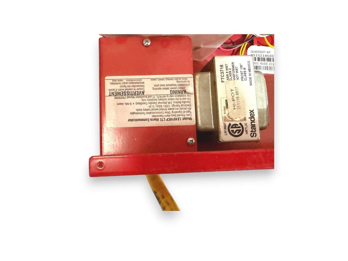 Red fire alarm communicator with Standex transformer, model LE4010CF LTE, for fire safety systems