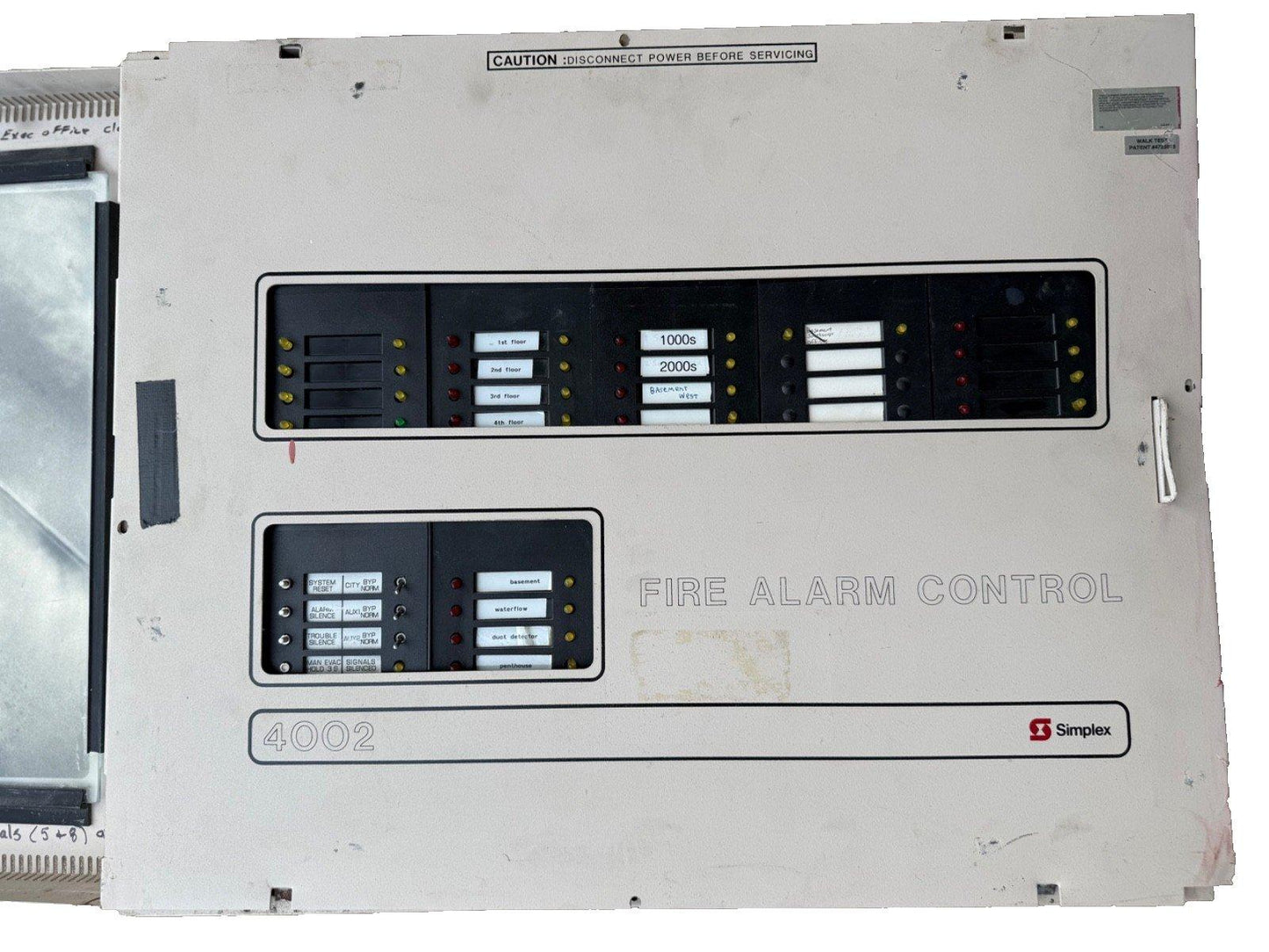 Simplex 4002 fire alarm control panel with floor and zone indicators for commercial safety systems