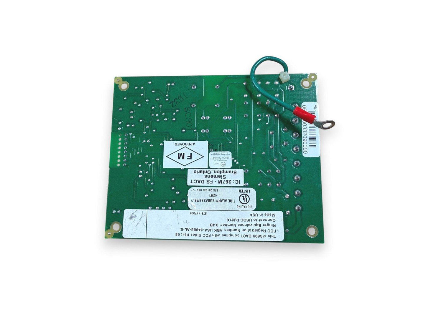 Siemens fire alarm control panel circuit board with FM approved label and wiring terminals