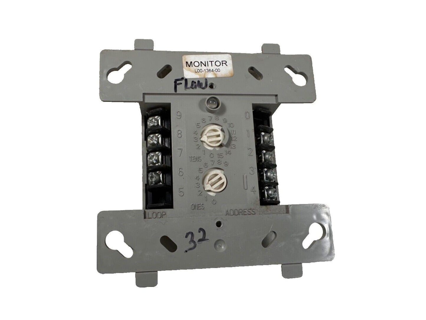 Used fire alarm monitor module with address dials and terminal connections, labeled L00-1364-00