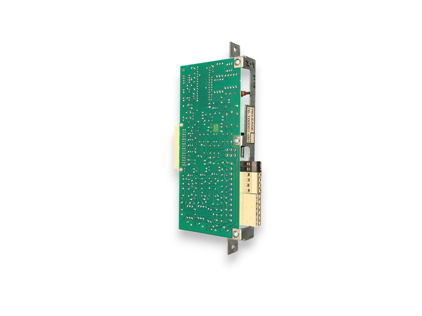 Green fire alarm control panel circuit board with connectors and release label