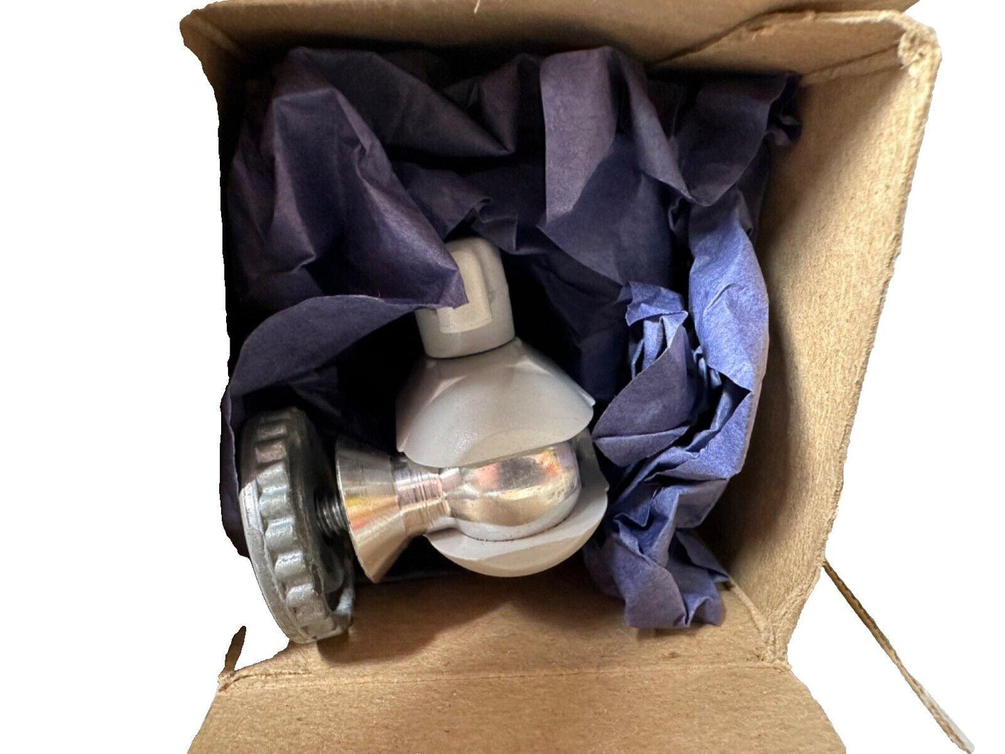Fire alarm pull station in box with protective wrapping, ready for installation or replacement