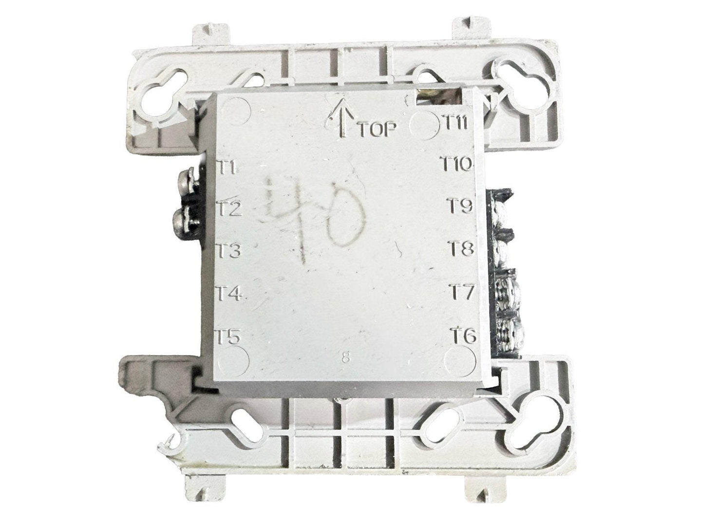 Fire alarm control module with terminal labels T1-T11, marked TOP for installation orientation