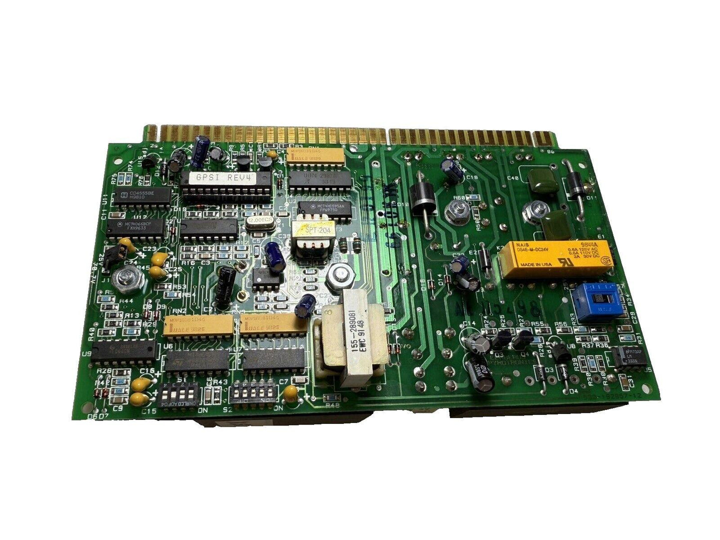 Fire alarm control panel circuit board with GPSI REV4 chip, capacitors, and connectors for fire safety systems
