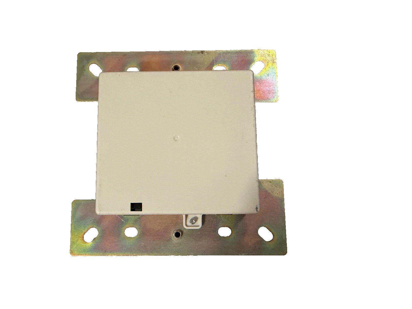 Fire alarm control module with metal mounting bracket for commercial security systems