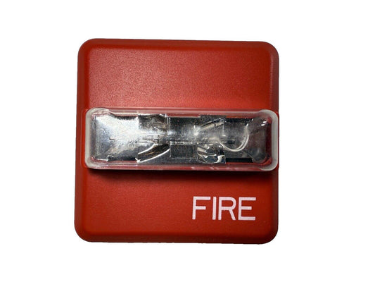 Red fire alarm pull station with clear cover and FIRE label, used for emergency fire safety systems