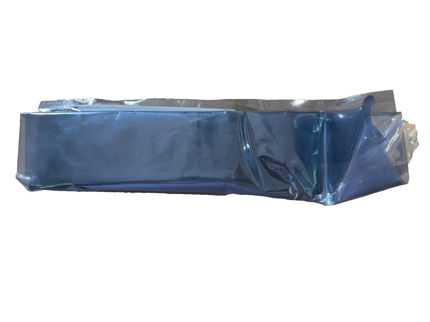 Sealed fire alarm equipment in protective plastic wrap, ready for installation or storage.
