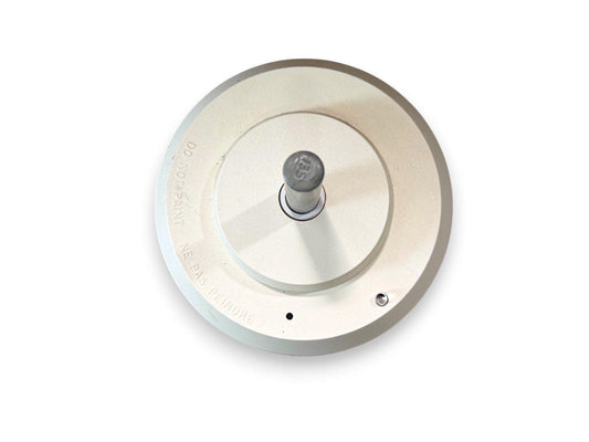 White fire alarm base with central screw and 'DO NOT PAINT' warning, for fire safety systems