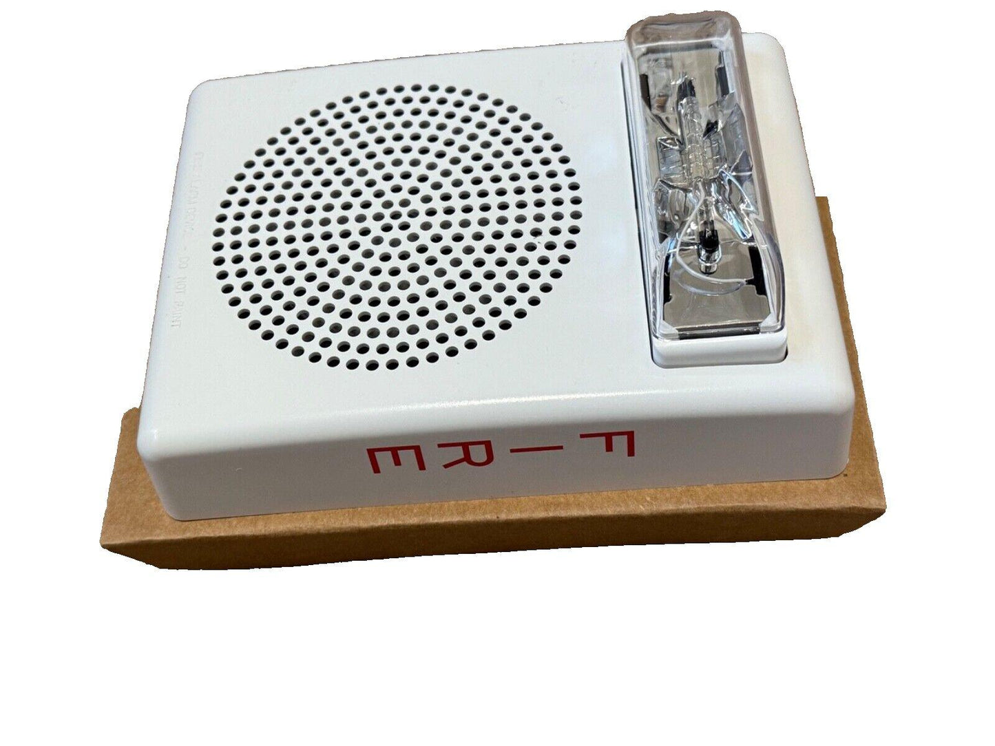 White fire alarm sounder with clear strobe light and red label, for commercial safety systems