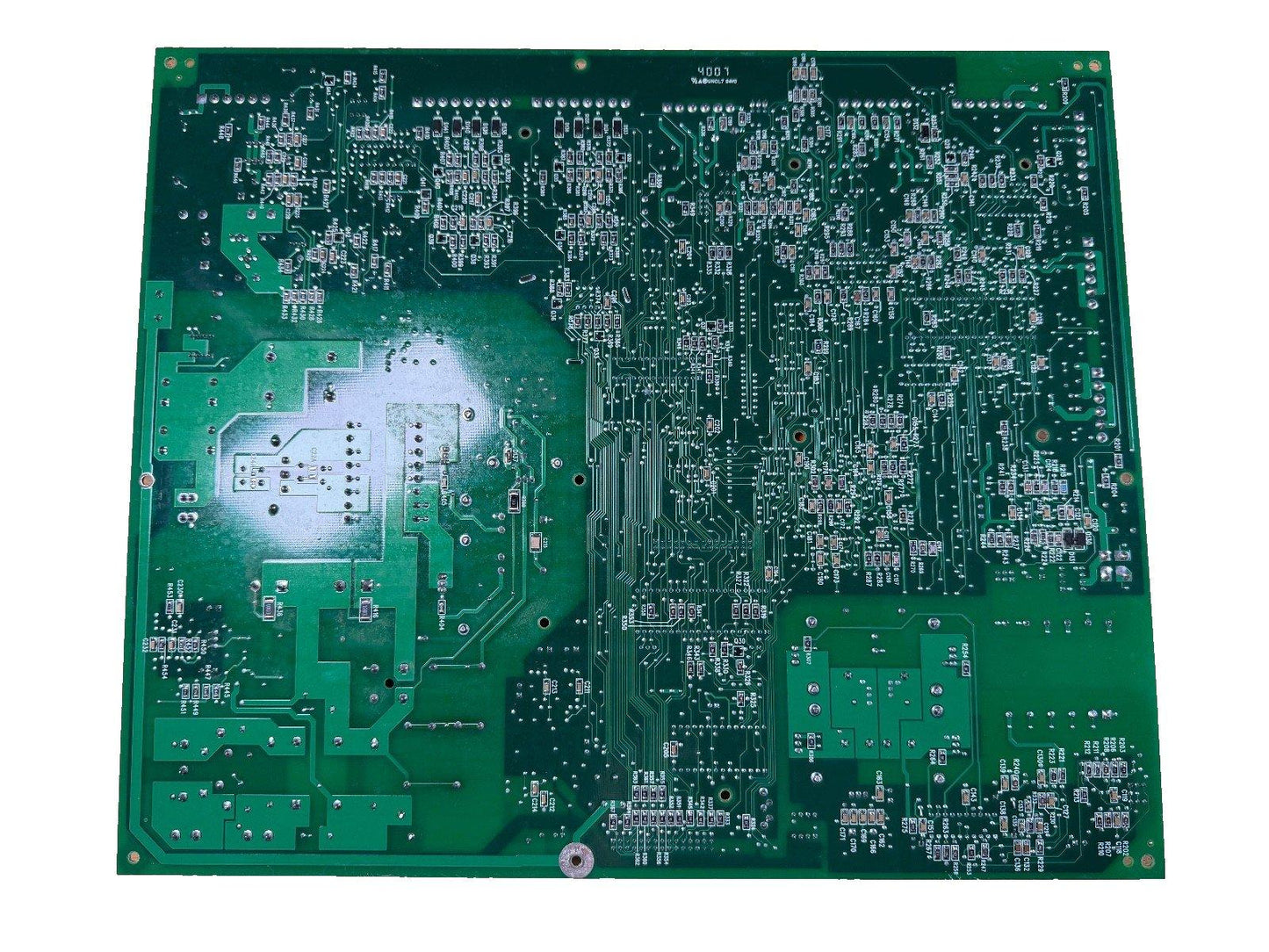 Green fire alarm control panel circuit board with detailed PCB traces and components