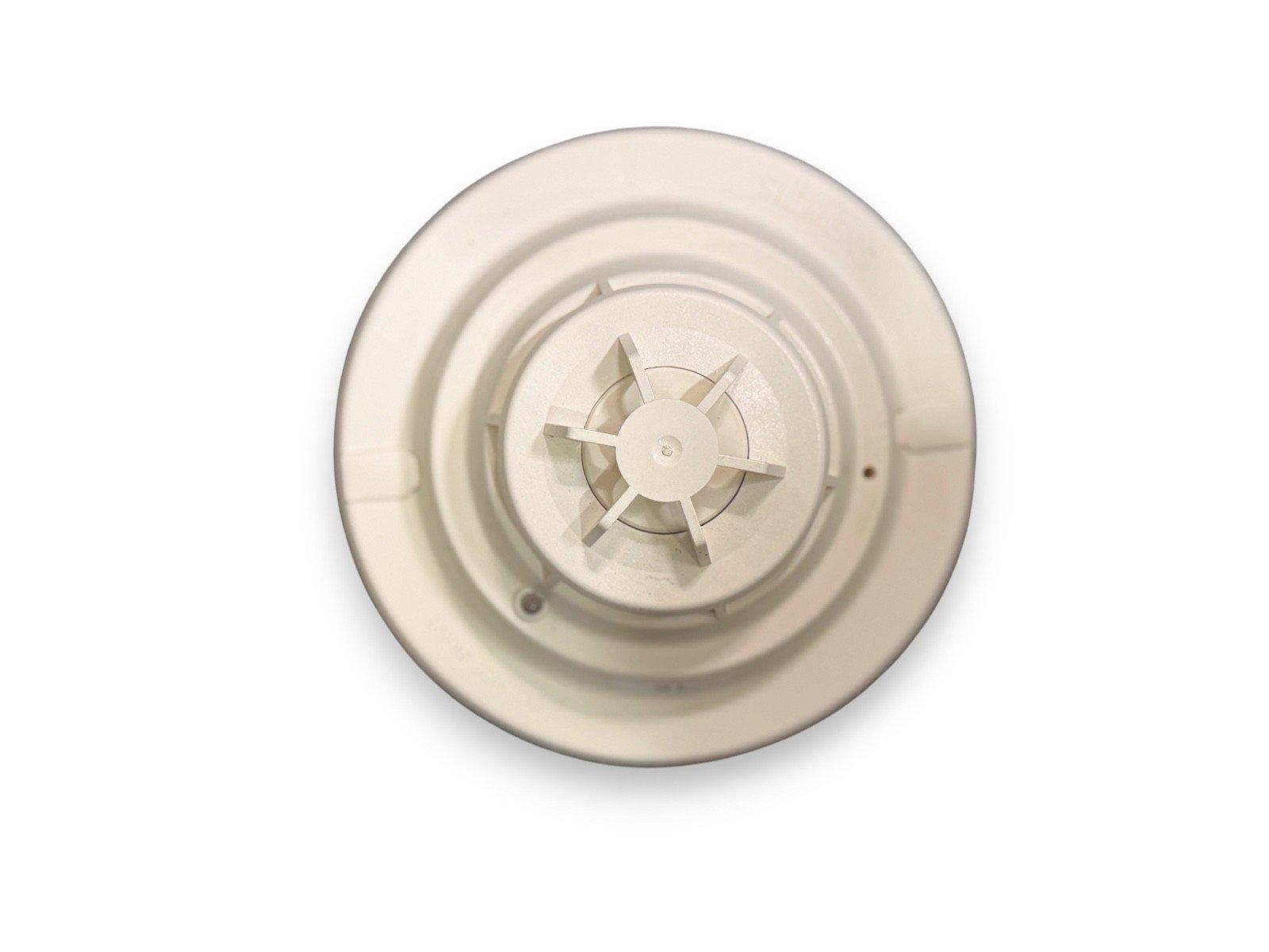 White ceiling-mounted smoke detector for fire alarm systems
