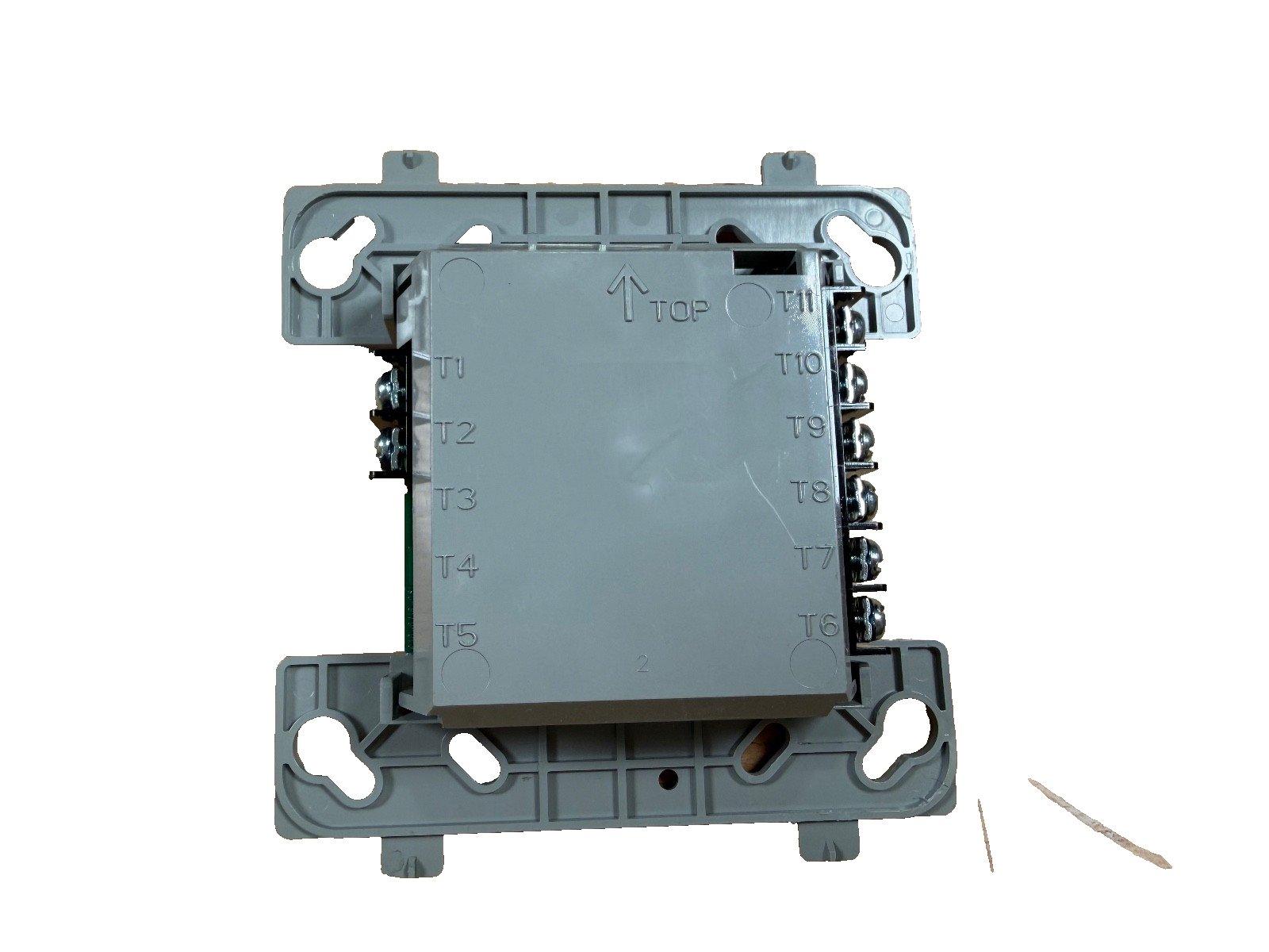 Fire alarm control module with terminal connections T1-T11, labeled top orientation, for commercial fire safety systems