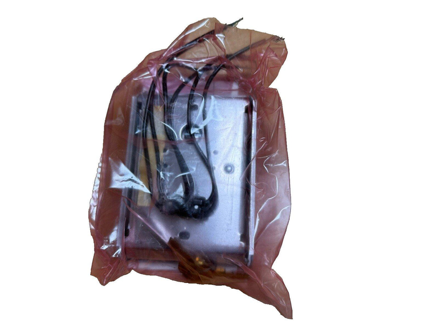 Fire alarm control panel with wiring, sealed in plastic bag for shipping or storage