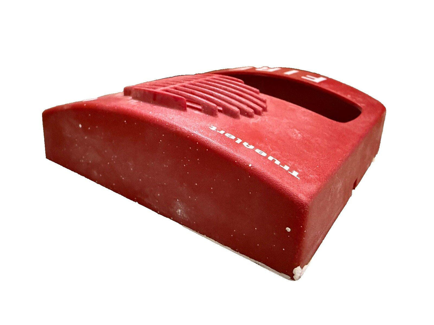 Red TrueAlert fire alarm pull station with visible wear, used fire safety equipment