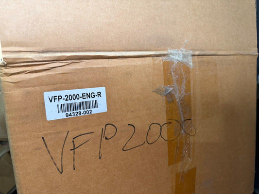 VFP-2000-ENG-R fire alarm equipment box with barcode and handwritten label, ready for shipping