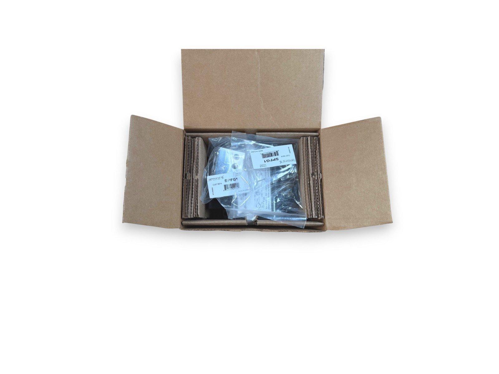 SPFG1 fire alarm component in open box, packaged for shipping