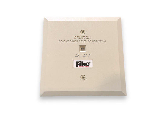 Fike fire alarm control panel with caution label and service instructions