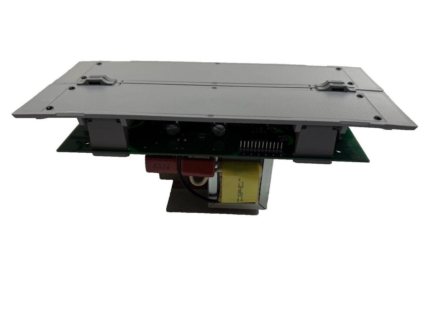 Fire alarm control panel with exposed circuit board and internal components for commercial safety systems