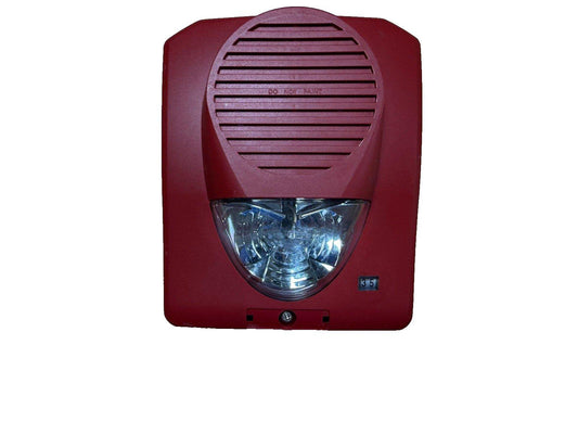 Red fire alarm horn strobe with clear lens and vented cover, labeled 'DO NOT PAINT'